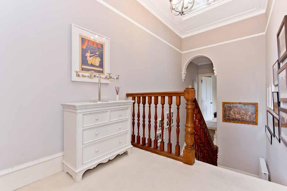 The second bedroom is particularly spacious, is double in size, and has a lovely aspect over the garden towards the hills to the rear.