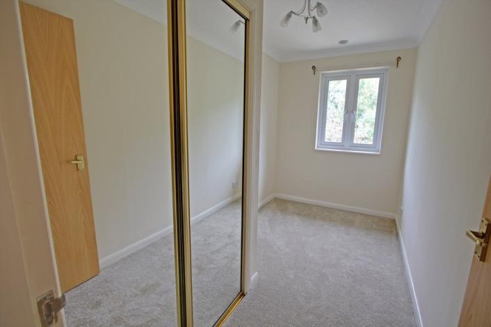 Light, bright and airy, this room has modern light carpet underfoot with light decor throughout and has the added benefit of modern ceiling lights and ceiling heating resulting in no radia tors
