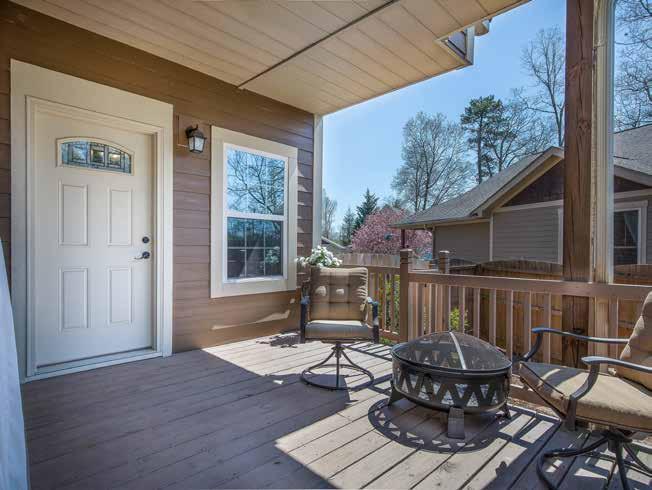 Enjoy a glass of wine in the evening with the neighbors on the covered back porch while watching your favorite sports team play on TV with the exterior mounted entertainment area.