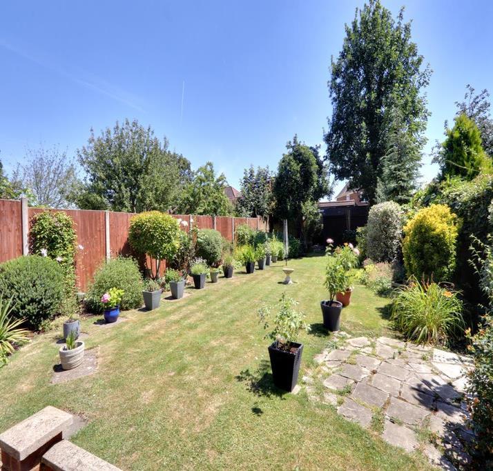 REAR GARDEN Wonderfully presented approximately 83 x 31 comprising:- Large paved patio area with brick walling leading to
