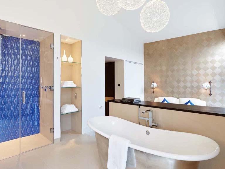 To combat regulation issues, there are three fiber-optic chandeliers above the bathtub that do not use electrics.
