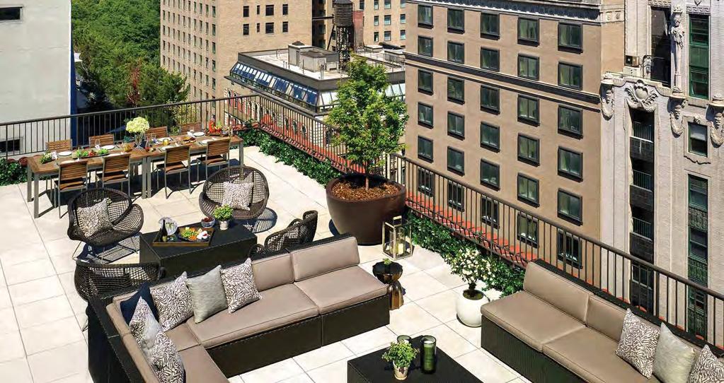 the Penthouse Terrace The 1,300 square-foot terrace offers beautiful views of the Midtown skyline and Central Park and features seating areas for over 30 guests and a communal table for
