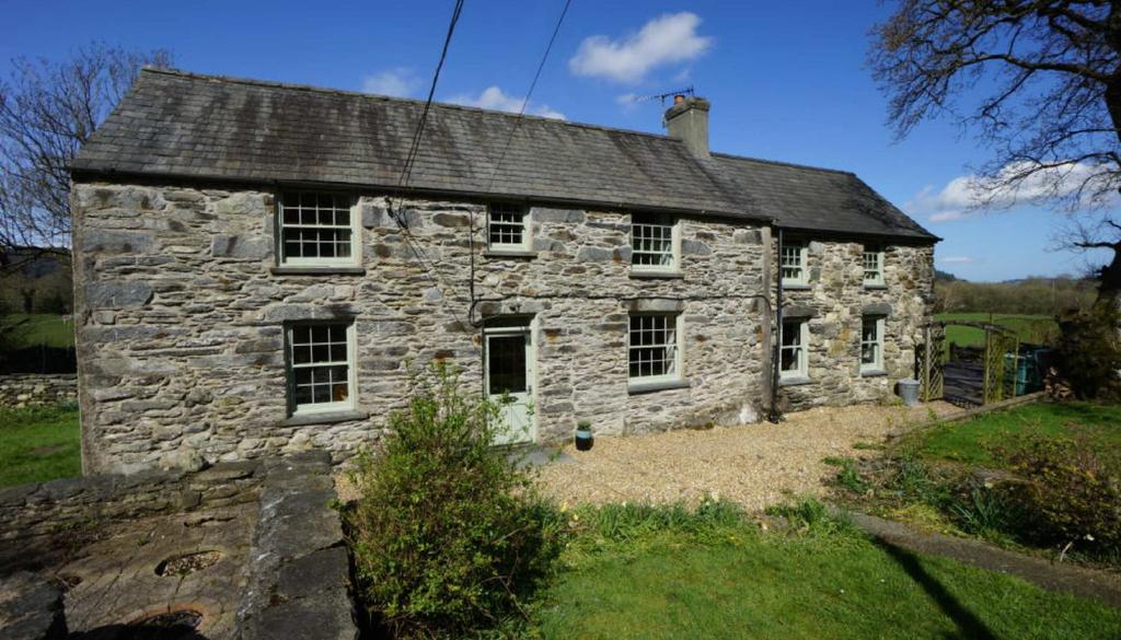 Tyddyn Bach Betws Y Coed 575,000 A stunning former farmhouse together with stone cottage and