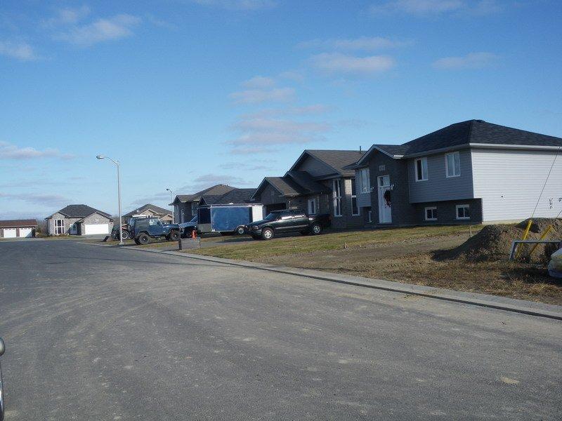 SINGLE DETACHED DWELLINGS ON EAST SIDE OF SERENNA DRIVE