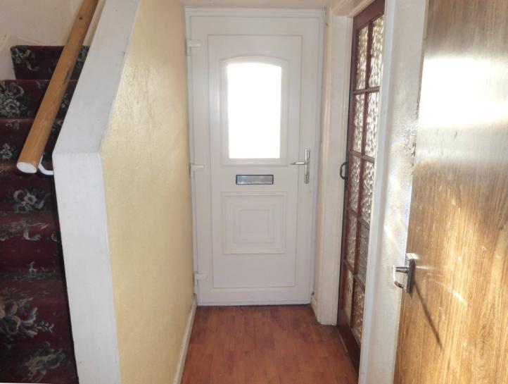 BRIEFLY COMPRISING Entrance Hall. Through Living Room. Dining Kitchen. Utility / Store Room. Staircase and Landing. Two Double Bedrooms. Single Bedroom. Bathroom.