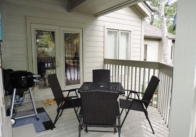 Private covered deck is great for grilling outside, and