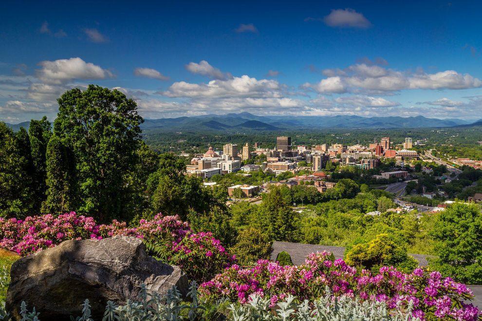 Asheville, NC Asheville is a city in western North Carolina s Blue Ridge Mountains. It s known for a vibrant arts scene and historic architecture, including the dome-topped Basilica of Saint Lawrence.