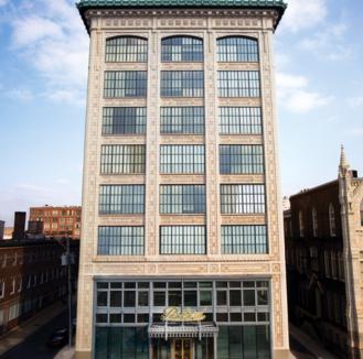 hat factory to be converted into 96 apartments, ground floor retail and a rooftop terrace.