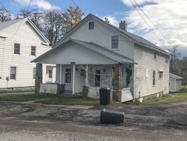 MLS S1123565 7518 Elm St, Lowville $23,000 Three level warehouse with deeded right-ofway.
